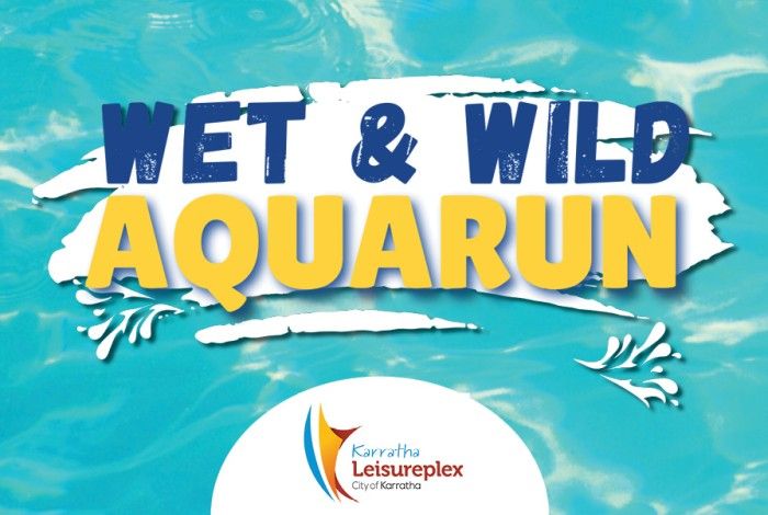 wet and wild aquarun with a white smear mark behind and blue ocean water as background