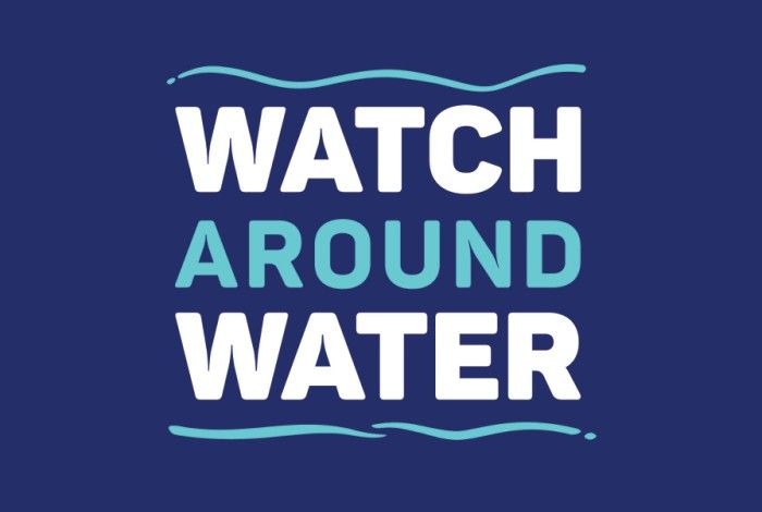 The words “WATCH AROUND WATER” are displayed in bold, uppercase letters on a dark blue background. “WATCH” and “WATER” are in white, while “AROUND” is in a light aqua blue. Decorative aqua wave lines appear above and below the text, reinforcing the water safety theme.